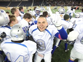 QB Ethan Diakow and Oak Park Raiders are number one after knocking off the St. Paul's Crusaders in the Winnipeg High School Football League's AAA final at Investors Group Field in Winnipeg, Man., on Fri., Nov. 7, 2014. Kevin King/Winnipeg Sun/QMI Agency