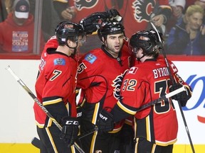 Flames defencemen T.J. Brodie (7) and Mark Giordano would be the top two scorers on more than half the teams in the NHL right now. (Jim Wells, QMI Agency)