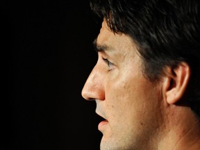 Liberal leader Justin Trudeau speaks to the media during the Federal Liberal summer caucus meetings in Edmonton August 20, 2014.  REUTERS/Dan Riedlhuber