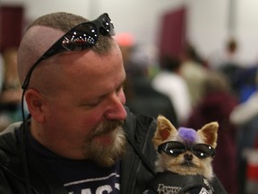 Jeff Scott drove all the way from Oshawa with his 6-year-old Pomeranian Tiffany whose haircut is only slightly more striking than his own. Scott tries to hit a few events like this weekend's Pet Expo. The pair were popular with many amateur photographers.
DOUG HEMPSTEAD/Ottawa Sun/QMI AGENCY