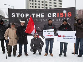 Edmonton muslims show their support for Canadian troops during a rally at Sir Winston Churchill Square in Edmonton, Alta., on Saturday, Nov. 8, 2014. Codie McLachlan/Edmonton Sun/QMI Agency