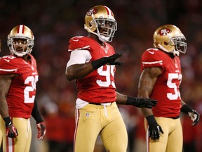 San Francisco 49ers outside linebacker Aldon Smith (99) reacts after sacking Chicago Bears quarterback Jason Campbell during the first half of their NFL football game San Francisco, California November 19, 2012. (REUTERS/Beck Diefenbach)
