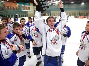 The Sudbury Wolves bantams celebrate with the Big Nickel trophy Sunday at Gerry McCrory Countryside Sports Complex. The Wolves are the first local team to win the Big Nickel bantam title since 1991.
