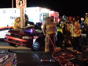 Two young men had to be extricated from a car late Saturday, Nov. 8, 2014  by fire crews who used the Jaws of Life to cut the roof off the car. Crews responded to Longfields Dr. near Chapman Mills Dr. around 10:30 p.m. where a car had struck a street light pole. A 17-year-old, who was the front-seat passenger, was initially unconscious and was treated by paramedics for multi-system trauma. He remains in critical condition at the Civic trauma centre.
Submitted photo by Adnan Ali.