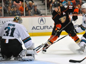 Anaheim Ducks right wing Corey Perry (10) shoots on goal against San Jose Sharks goalie Antti Niemi (31) during the third period at Honda Center on October 26, 2014 in Anaheim, CA, USA. (Gary A. Vasquez/USA TODAY Sports)