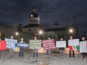 More than 25 people attended a protest in Springer Market Square on Saturday evening in solidarity for the families of the 43 missing student teachers in Mexico. It's been 43 days since the students disappeared and the local Latino community want to raise awareness of the ongoing issue. (Julia McKay/The Whig-Standard)