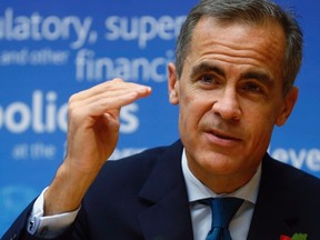 Bank of England governor and chairman of the Financial Stability Board Mark Carney addresses a news conference at the Bank for International Settlements (BIS) in Basel Nov. 10, 2014.  REUTERS/Arnd Wiegmann