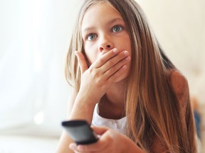 Parents can quickly become "desensitized" to sex and violence in movies, which makes them more willing to permit younger children to watch the same content, a new U.S. study says.(Fotolia)