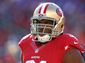 Defensive end Ray McDonald #91 of the San Francisco 49ers warms up before their game against the Chicago Bears at Levi's Stadium on September 14, 2014 in Santa Clara, California. (Jeff Gross/Getty Images/AFP)