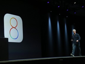 Apple CEO Tim Cook introduces the iOS 8 operating system during his keynote address at the Worldwide Developers Conference in San Francisco, June 2, 2014. REUTERS/Robert Galbraith