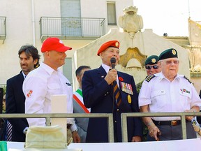 Courtesy of Max Fraser
Belleville veteran Bob Wigmore speaks in the Sicilian town of Leonforte, where he fought during the Second World War, in a July 2013 photo from the Operation Husky 2013 pilgrimage. To his right is tour organizer Steve Gregory; to Wigmore's left is Royal Canadian Regiment veteran Sheridan Atkinson.