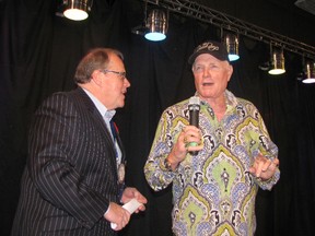 Beach Boy Mike Love, right, and Don “Sparky” Leonard, president of the Rotary Club of Chatham, lead a sing-a-long of Beach Boys songs at the club's 75th annual dinner. The banquet was held Nov. 9 at the John D. Bradley Convention Centre.