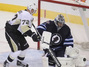 Jets goalie Ondrej Pavelec is no fan of the shootouts. Maybe he'll face a lot less of them if the NHL adopts the three-on-three overtime now on trial in the AHL.
>Brian Donogh/Winnipeg Sun/QMI Agency