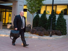 John Barbro, a correctional officer at OCDC leaves the Elgin Street courthouse on Monday, Nov. 1, 2014. He is on trial charged with the assault of an inmate back in October 2010.
DANI-ELLE DUBE/Ottawa Sun/QMI AGENCY