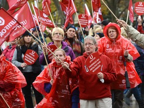 Hundreds of members of Unifor stage a rally in Victoria Park in London last Thursday to support London health-care workers who are in contract negotiations with the hospitals. (MORRIS LAMONT, The London Free Press)
