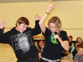 Aberarder Central PS student Matt McIntyre shakes hips with singer/songwriter and motivational speaker Sara Westbrook during her UPower presentation on Nov. 4.
CARL HNATYSHYN/SARNIA THIS WEEK/QMI AGENCY