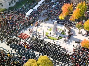 More than 10,000 people attended the Remembrance Day ceremony at the cenotaph in London Tuesday ? the largest crowd for the city in years. (DEREK RUTTAN, The London Free Press)