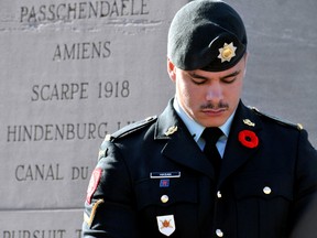 A vigil guard stands next to the cenotaph in Parade Square at Wolseley Barracks in London Ont. Nov. 11, 2014. CHRIS MONTANINI\LONDONER\QMI AGENCY