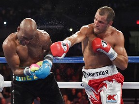 Sergey Kovalev punches Bernard Hopkins during their light heavyweight title fight at Boardwalk Hall Arena on November 8, 2014 in Atlantic City, N.J. (Al Bello/Getty Images/AFP)