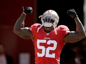 Patrick Willis of the San Francisco 49ers runs onto the field during player introductions for their game against the Kansas City Chiefs at Levi’s Stadium on October 5, 2014 in Santa Clara, California. (Ezra Shaw/Getty Images/AFP)