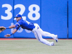 Blue Jays general manager Alex Anthopoulos (inset) said yesterday that Dalton Pompey is an “above-average defender” but needs to “tighten up his game.” (Ernest Doroszuk/Toronto Sun)