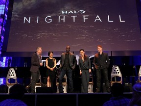 Xbox's Larry Hryb (Major Nelson),  executive producer at 343 Industries Studio Kiki Wolfkill, and actors Mike Colter, Christina Chong, and Steve Waddington introduce the premiere of "Halo: Nightfall" at the Avalon Theatre on Monday, Nov. 10, 2014 in Los Angeles.  (Ari Perilstein/Getty Images for Microsoft/AFP)