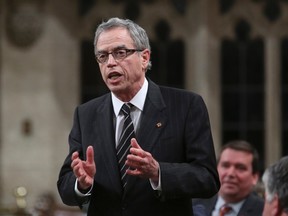 Finance Minister Joe Oliver speaks during Question Period in the House of Commons on Parliament Hill in Ottawa Nov. 6, 2014. REUTERS/Chris Wattie