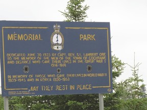 A sign erected to commemorate the lives lost in Cochrane during the great wars.
