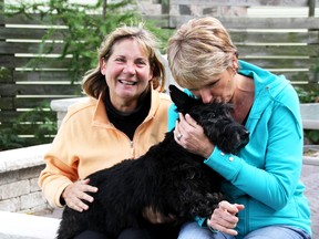 Scottish terrier Bella is the puppy mill survivor that inspired Pam Chin, right, to start researching and investigating dog breeding. Chin is behind a new Bracelets for Bella campaign, aimed at raising awareness about puppy mills. Also pictured is Kijiji Stop Selling Puppies group supporter Georgette Parsons. (Observer file photo)