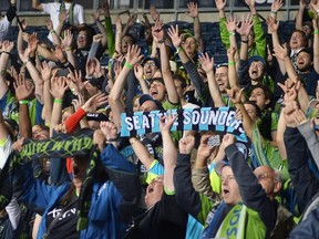 Seattle Sounders FC fans cheer cheer on their team during a match this season. (AFP)