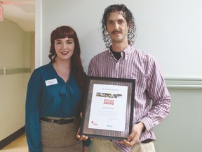 Pictured here are CPR instructor from Vantage First Aid & C.P.R. Solutions, Ashley Anderson, and Dungannon resident, James Boshart. On November 4 The Canadian Red Cross honoured Boshart by presenting him with a Rescuer Award. This past August Boshart saved a stranger’s life by performing CPR at a local garage sale.