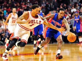 Chicago Bulls guard Derrick Rose and Detroit Pistons guard Brandon Jennings. (USA Today sports)
