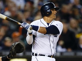Detroit Tigers designated hitter Victor Martinez hits a double during MLB play against the Chicago White Sox at Comerica Park. (Rick Osentoski/USA TODAY Sports)