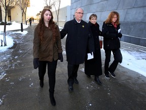 The family of David Finkelman leaves the downtown courthouse in Edmonton, Alta., on Wednesday Nov 12 , 2014. Parents Steven Finkelman and Jane Cardiillo gave their impact statements during the sentencing of the driver who struck and killed their son. Perry Mah/Edmonton Sun