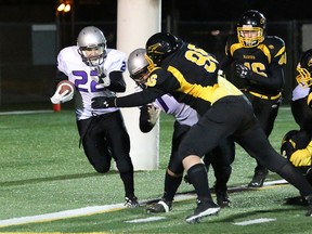 Lo-Ellen Knights running back Matt Glass rushign the ball against the Lively Hawks during the senior boys high school football championship game at James Jerome Sports Complex last Friday night. Glass has been named the Cambrian College/Sudbury Star High School GameChanger of the Week award winner for his performance during the game.