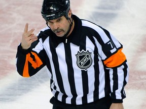 Referee Bill McCreary holds the NHL record of officiating in 44 Stanley Cup final games. (Eric Bolte/QMI Agency file)