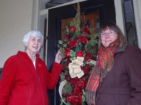 Faye Ferguson, left, publicity chair for the Christmas in St. Thomas Tour of Homes, stands with decorator Crystal Trojek at 64 Gladstone Ave. in St. Thomas, one of five homes on the tour.

Ben Forrest/Times-Journal