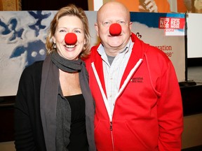 Honourary co-chairs Kristen Crowe and Rick Kevan wear their red noses after helping to kick off the 11th year of Operation Red Nose Quinte, at the Empire Theatre Wednesday evening.  - Emily Mountney-Lessard/The Intelligencer/QMI Agency