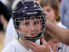 Bauer can no longer claim its helmets prevent concussions. (QMI Agency)