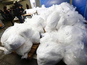 The German Criminal Investigation Division (BKA) displays seized Crystal Methamphetamine (Crystal Meth) and Chlorephedrine during a news conference at the BKA office in Wiesbaden November 13, 2014. Police found 4 kilograms of Crystal Meth and 2.9 tons of Chlorephedrine, a base substance to produce Crystal Meth, during a police raid in Leipzig on November 5 and November 8, 2014. REUTERS/Ralph Orlowski