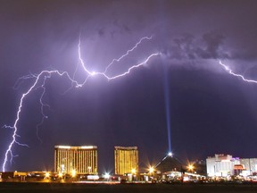A monsoon lightning storm strikes over Las Vegas, Nevada in this file photo taken July 7, 2014. Rising global temperatures may cause a big jolt in the number of lightning strikes in the United States over the rest of the 21st century in the latest example of extreme weather spawned by climate change, scientists say.  REUTERS/Gene Blevins/Files