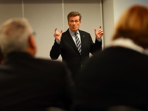 Mayor-elect John Tory speaks during the opening remarks of his transition council meeting at Metro Hall in Toronto on Thursday, November 13, 2014. (Dave Abel/Toronto Sun)