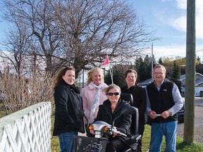 Angels Within Us donated two scooters in a week to people who needed a hand getting around. Left to right: Sherry Mackenzie, Michelle Duncan, Joanne Hickey, Colleen Parkin, Larry Hyshka. John Stoesser photo/QMI Agency