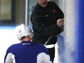 Ottawa 67's head coach Jeff Brown maps out a play during practice. (Chris Hofley/Ottawa Sun)