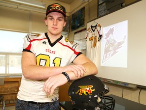 Sam Sedore, of Lo-Ellen Park Secondary School, signed a letter of intent to play football at the University of Guelph. JOHN LAPPA/THE SUDBURY STAR