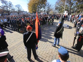 Hundreds of people, from residents, war veterans, members of the Royal Canadian Air Force posted at 8 Wing/CFB Trenton, Ont. to local politicians attend Belleville's Remembrance Day service at Memorial Park Tuesday, Nov. 11, 2014. - JEROME LESSARD/THE INTELLIGENCER/QMI AGENCY
