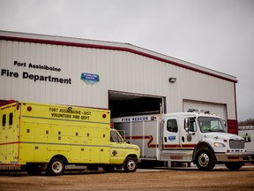 The Fort Assiniboine fire department's old mobile command unit, is pictured (left) next to the department's new unit, which was custom built and arrived in August 2014, outside of the Fire Hall in Fort Assiniboine, Alta. on Thursday, Nov. 6, 2014. 
 
Adam Dietrich | Whitecourt Star