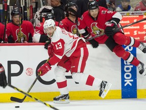 Detroit Red Wings centre Pavel Datsyuk (13) skates with the puck in the first period against the Ottawa Senators at the Canadian Tire Centre on Nov 4, 2014 in Ottawa, Ontario, CAN. (Marc DesRosiers/USA TODAY Sports)
