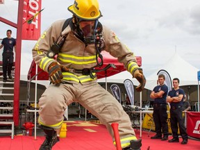 Point Edward firefighter Ian Van Reenen competes at the national Scott FireFit Championships in Quebec. The 21-year-old recently walked away with a world title in the men's tandem competition and a silver medal in individual competition at the world championships in Arizona. SUBMITTED PHOTO