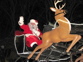 Santa Claus waves to the crowd in Chatham during the parade on Nov. 14